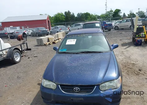 2002 Toyota Corolla Ce/Le/S из США, поврежденный, VIN 2T1BR18E52C547715